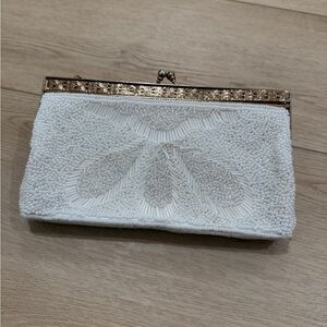 Vintage hand beaded white clutch. Perfect for bridal events.